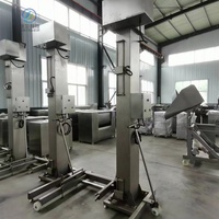Chariot élévateur vertical Henger en acier inoxydable SUS304 pour bacs à viande, machine de levage multi-tension pour la transformation alimentaire
