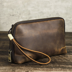 Pochette multifonctionnelle vintage en cuir de vachette véritable, organisateur de câbles fait main, avec dragonne et fermeture éclair - Product Image 1
