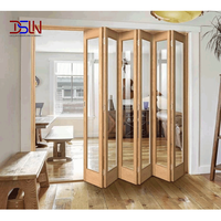 Porte patio bi-pliante moderne en aluminium à rupture de pont thermique avec double vitrage feuilleté, coupe-vent et écoénergétique pour cour intérieure