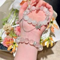 Bracelet de luxe de haute qualité pour femme, élégant, fait main, avec perles roses transparentes et accent étoile, idéal pour les soirées