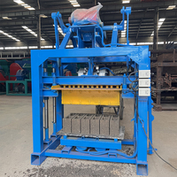 Machine manuelle de fabrication de blocs de béton QTJ4-40 avec moteur, machine à briques autobloquantes à haut rendement à vendre au Kenya