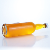 Harga Pabrik Langsung Botol Transparan 330ml 500ml 12oz Botol Kaca Bir untuk Bir Air Soda Minuman Dengan Tutup Sekrup