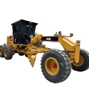 Japan imported CAT 140K used hydraulic tire type car grader sales of cheap distribution parts
