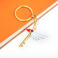Collier Clé Ailée, Pendentif Clé Oiseau Doré, Ensemble Collier et Porte-clés Clé Fantaisie, Bijoux Cosplay Anime avec Cristal Rouge
