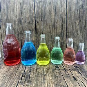 Nouvelle bouteille en verre transparente rayée de 330 ml et 480 ml avec couvercle antivol pour le stockage et l'emballage de lait, jus et café - Product Image 2