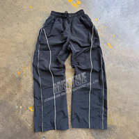 4045 survêtement coupe-vent léger en nylon personnalisé pour hommes ensemble de jogging en polyester vestes zippées réfléchissantes et ensemble de pantalon de survêtement en nylon