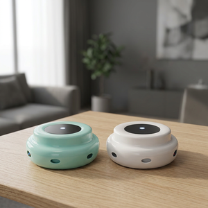 Interactive Laser Cat Toy Automatic Rechargeable Plastic Modern Design for Cats White and Mint Green - Product Image 1