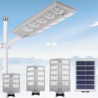 Lampu Jalan tenaga surya semua dalam satu plastik ABS lampu surya Sensor gerak senja ke fajar luar ruangan 3000W dengan dukungan lengan teleskopik