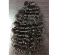 Extensions de cheveux humains à donneur unique indien brut pur naturel ondulé bouclé avec alignement des cuticules non transformés approvisionnement en gros