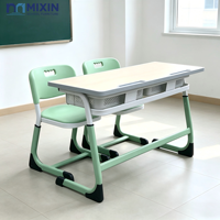 Table et chaise d'école deux places, table de classe avec siège en plastique vert et dossier, boîte à livres en treillis métallique pour collège
