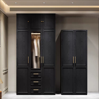 Armoire à portes battantes en placage de bois noir, style Mid-Century, lignes épurées, meuble de chambre