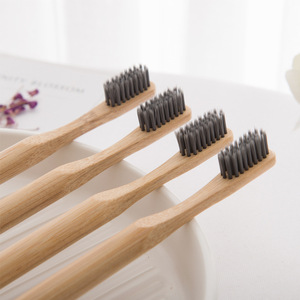 Cepillo de dientes redondo de carbón con mango para adultos, cerdas suaves, venta al por mayor directa de fábrica, artículos de tocador para hoteles y hostales - Product Image 2