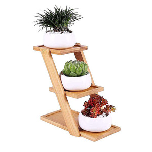 Petit support <span class=keywords><strong>de</strong></span> plante mobile personnalisable présentoir <span class=keywords><strong>de</strong></span> fleurs d'intérieur en bois <span class=keywords><strong>de</strong></span> bambou multicouche pour centre commercial fini en <span class=keywords><strong>peinture</strong></span> - Product Image 1