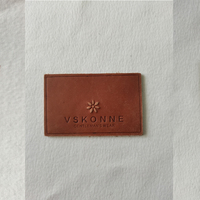 Étiquette de vêtement à motif évidé Seal Étiquette de jean Patch en cuir personnalisable