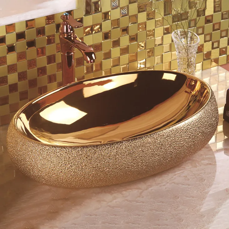 Decorazioni per la casa moderne di lusso ovale dorato vaso lavello ciotola in oro rosa lavabo da appoggio lavelli da bagno in ceramica