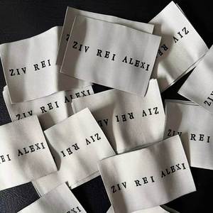 Private White <b>Label</b> Clothing Manufacturers High Density Straight Cut Woven <b>Labels</b> for Garment Bags - Product Image 1