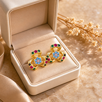 Boucles d'oreilles clous en laiton plaqué or 18 carats avec fleur en ruban noué et zircone multicolore, bijoux de mode pour femmes, vente en gros, OEM personnalisé