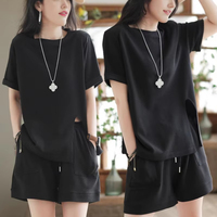 Ensemble décontracté deux pièces pour femme : T-shirt vintage ample à manches courtes et short au-dessus du genou, couleur unie, sans col, mode été 2026
