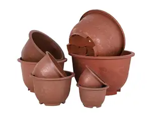 Wholesale Indoor outdoor terracotta round plastic flower pots plant pots