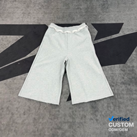 Pantalon de survêtement large personnalisé à marque privée, style streetwear, gris chiné, taille élastique, ourlet brut, coupe culotte