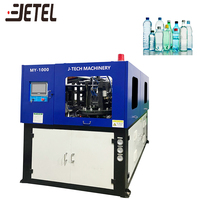 Machine de soufflage et de lavage automatique de bouteilles PET pour jus/eau, à cavité unique, 500 ml, 1000 BPH, contrôlée par PLC et entraînée par moteur