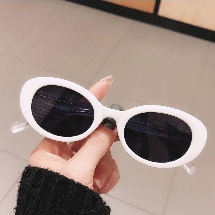 White frame grey lens