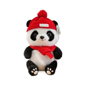 CE/ASTM peluche grossisti simpatici e teneri Panda in stile popolare imbottito con cappello rosso sciarpa peluche per regali di Capodanno - Product Image 1