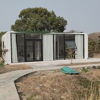 Maison à capsule spatiale mobile de luxe Maison conteneur avec chambre à coucher, cuisine, toilettes et conception à double histoire pour le camping en plein air