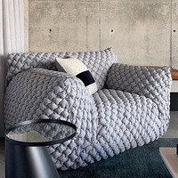 Chaise longue en velours bleu italien avec pouf paresseux en éponge pour le salon et la chambre à coucher.