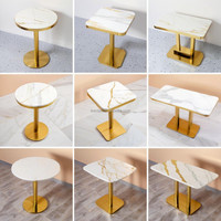 Table de restaurant carrée en pierre frittée Leer avec bord en PVC, base en acier inoxydable doré, design moderne, fonction plaque de cuisson à induction