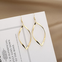 Boucles d'oreilles tendance en alliage super brillant, torsadées avec diamants, accessoires exagérés pour femmes