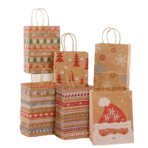 Sacs cadeaux jetables en papier kraft imprimés, motif Père Noël, flocon de neige, pois, dessin animé, rayures, sapin de Noël, bonbons, biscuits - Product Image 1
