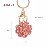 Porte-clés de voiture en alliage de zinc, style rose camélia japonaise, design moderne, avec pendentif USB, vente en gros