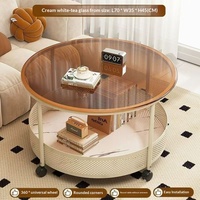 Table basse ronde mobile moderne de style crème à double niveau avec rangement en métal et roulettes universelles pour la maison