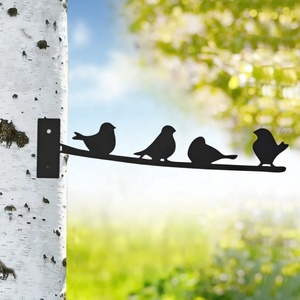 Adorno de jardín para exterior: Figuras modernas de niña oruga, lobo, duende bailarín, pingüino, águila y foca con acabado en efecto oxidado. - Product Image 3