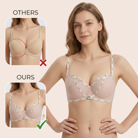 Soutien-gorge balconnet push-up en dentelle rose poudré, confortable et offrant un bon maintien pour femmes, idéal pour le quotidien.