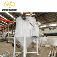 Le noyau d'alimentation en spirale du séchoir vertical hybride comprend un moteur de boîte de vitesses portant des produits chimiques aliments hôtels vis pompe doseuse à pression