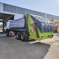 Camion compacteur de déchets Sinotruck Howo pour le transport des ordures