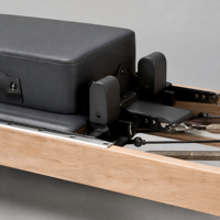 Machine de Pilates Reformer avec résistance réglable pour un entraînement complet du corps à domicile