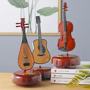 2023 High quality sells well Custom logo mini Violin wind up music box mini guitar carousel music box