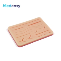 Kit de pratique de suture chirurgicale pour l'entraînement à la suture, coussin de suture en silicone avec plaies pré-coupées et kit d'outils