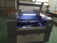 Machine de gravure laser CO2 CNC 6090 de petite taille 60W 80W 120W 150W / machine de découpe laser CO2 / découpeuse laser pour la publicité
