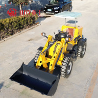 Chargeur frontal diesel Shanli 600 kg avec une capacité de godet de 0,6 m3, 4 roues motrices, haute efficacité, fabriqué dans le Shandong