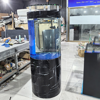 Aquarium cylindrique en verre sur pied noir avec système de filtration intégré pour la décoration de la maison et du salon