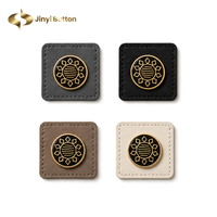 Étiquettes en cuir cousues sur mesure Jinyi pour hijabs, abayas, sacs et vêtements – Fabrication OEM/ODM