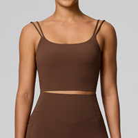 Ensemble de yoga 2 pièces pour femmes, vêtements de sport et fitness, couleur unie avec poches, débardeur de yoga à dos évidé et short taille haute effet push-up