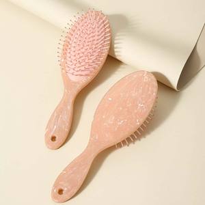 2025 ecológico nueva moda diseño único cojín de aire desenredante cepillo para el cabello húmedo y seco cepillo de pelo de mármol peine - Product Image 6