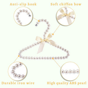 Vente <span class=keywords><strong>en</strong></span> gros de vêtements de luxe pour femmes <span class=keywords><strong>en</strong></span> plastique antidérapant perlé <span class=keywords><strong>cintre</strong></span> pour enfants bébé enfant boutique - Product Image 3