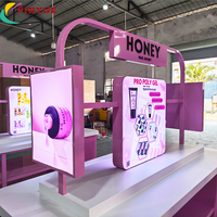 Kiosque mobile personnalisé rose pour vernis à ongles avec éclairage LED, idéal pour les événements en centre commercial et la promotion de marques de beauté et d'art des ongles