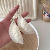 Porte-clés Pendentif Miniature 3D Simulation Alimentaire (Dumplings) – Jouet Sensoriel Anti-Stress à Presser et Rebondissant pour Adultes et Enfants – Cadeau en PVC